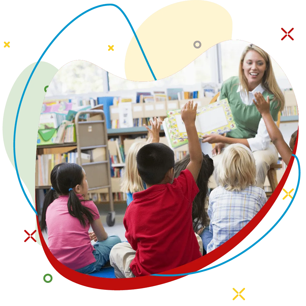 Teacher reading to a group of preschoolers in a classroom library